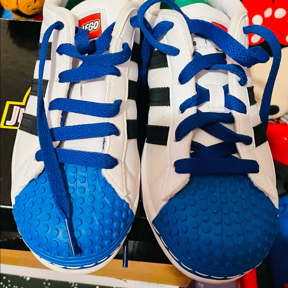 Blue, White, Black Lego Adidas superstars.